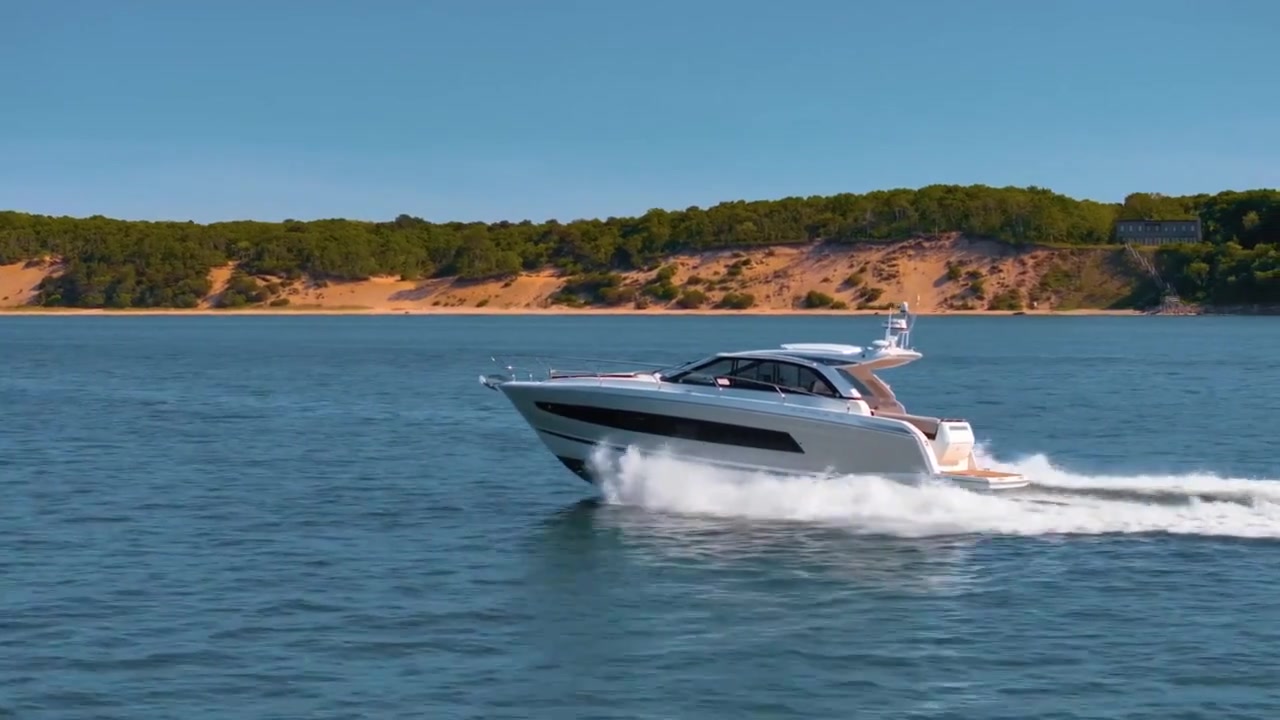 Oasis yacht carving a wake through Long Island waters